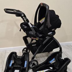 Set of Graco Snugride Snuglock 35 Infant Car Seat with two car adapters and a folding travel stroller.