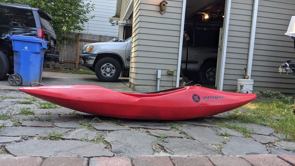 Whitewater Kayak Perception Phat With Kayak Racks and Skirt.