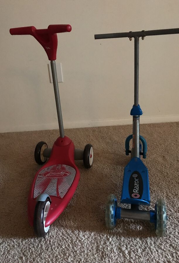 Radio flyer in red and Razor scooters in blue for sale