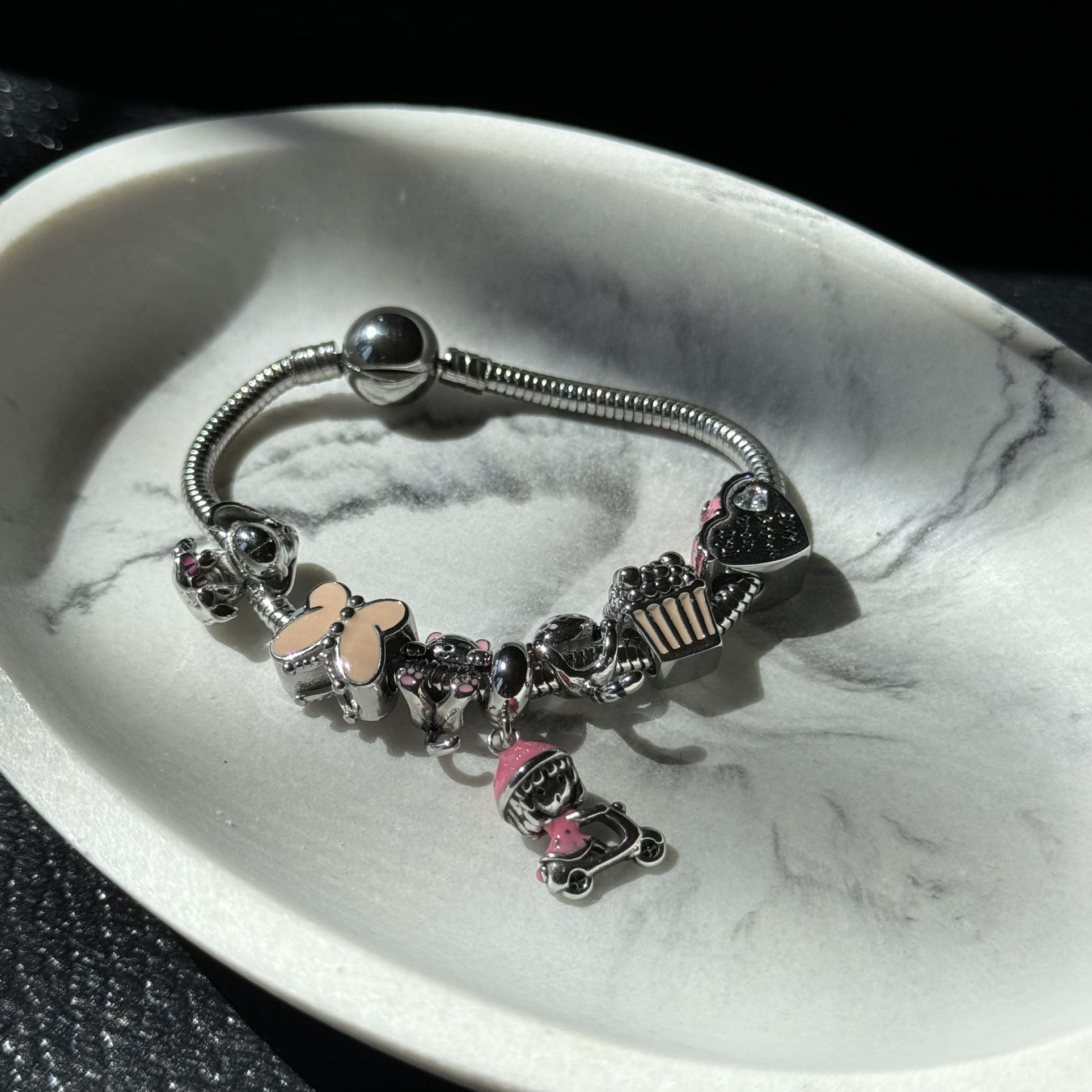 pink charm bracelet with charm all of stainless steel 16 cm