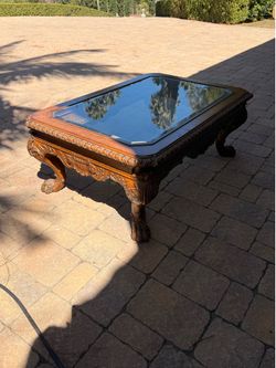 Ornate glass wood top coffee table