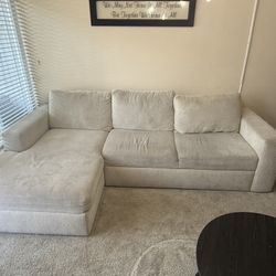 Living Spaces Sebastian 111” Sleeper Sectional w/ Storage Chaise