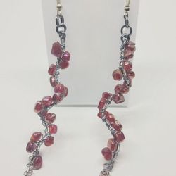 handmade Silver  spiral dangle earrings with beautiful ruby red beads