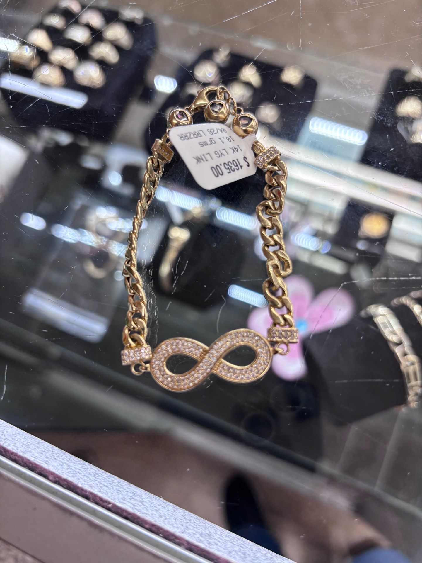 Infinity bracelet with diamond stone
