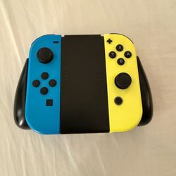 Official Nintendo Switch Joy-Con Pair (Neon Blue/Neon Yellow) + PowerA Grip