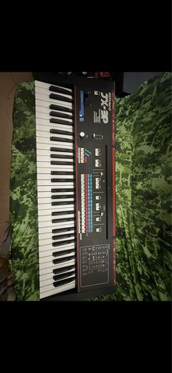 Programmable synthesizer keyboard