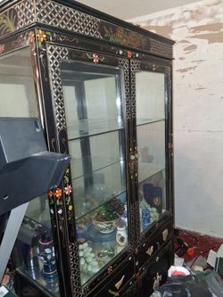 Chinese cabinet black with maybe real inlaid pearls figures