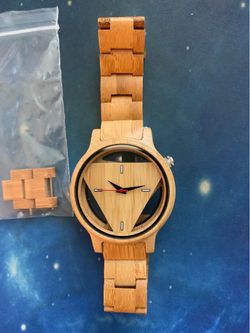 Unique wooden wristwatch with Geometric design.