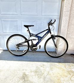 MGX 21-Speed Dual-Suspension Mountain Bike with 26” X 1.95 knobby tires