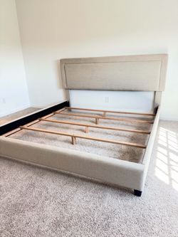 Beige upholstered pottery barn custom king bed