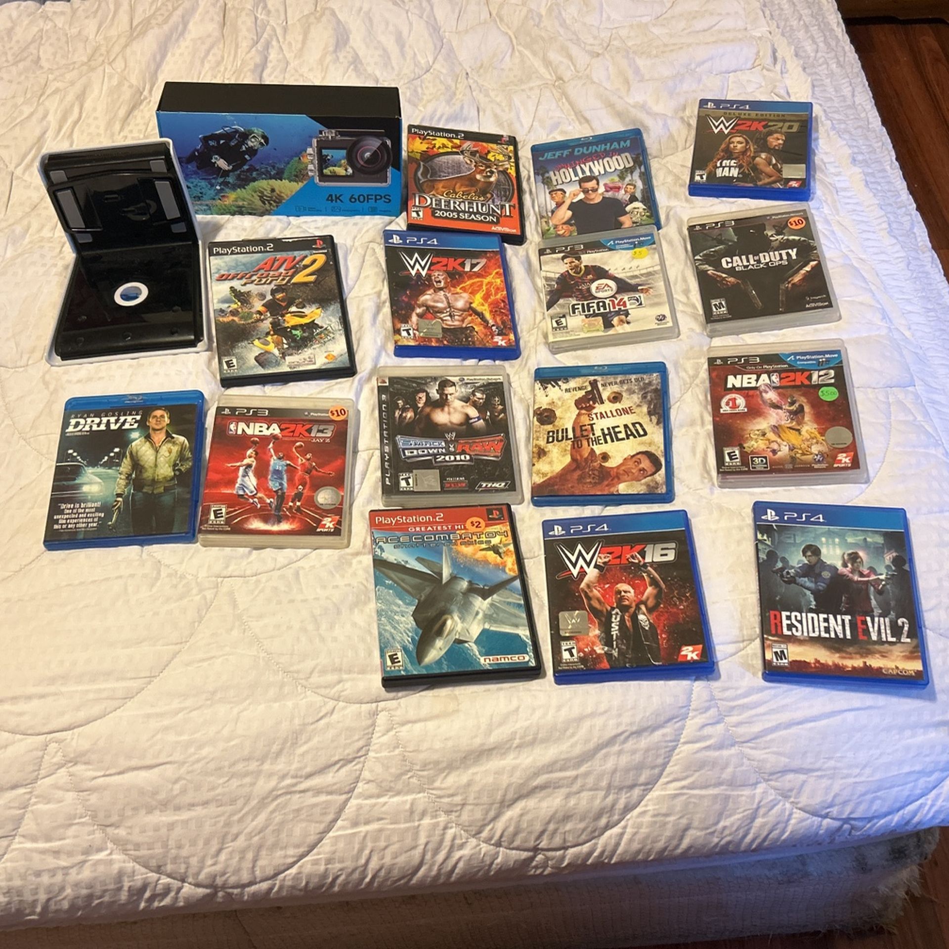 GoPro PS4 Games Ps3 Games PS2 Games 3 Blu Ray DVDs And a ps5 Stand