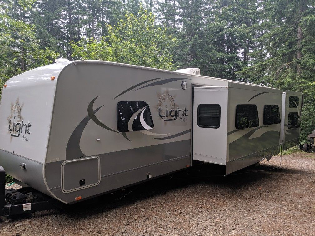 2016 open range bunkhouse 35' triple slide