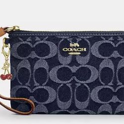 Coach denim cherry charm wristlet