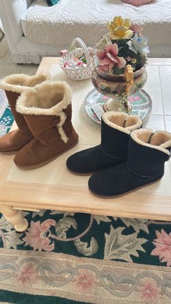 Two pair of upper leather faux fur ladies boots