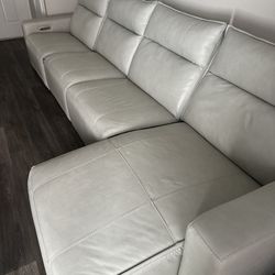 White leather reclining sectional couch
