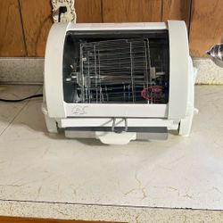George Forman Rotisserie ( New)