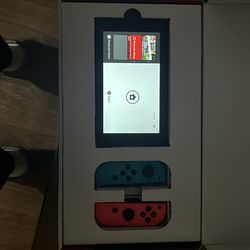 Nintendo Switch Bundle 32GB + 2 Games + 2 Case – Great Condition”