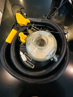 Flowbee home haircutting system