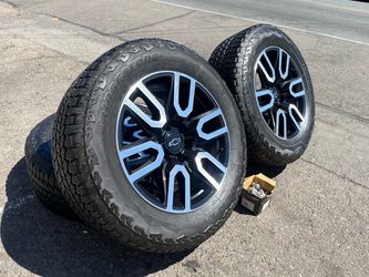 Chevy and gmc wheels 275/60/20” Bridgestone