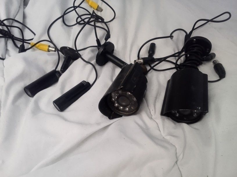 Four Surveillance Cameras Two Bullet Cams