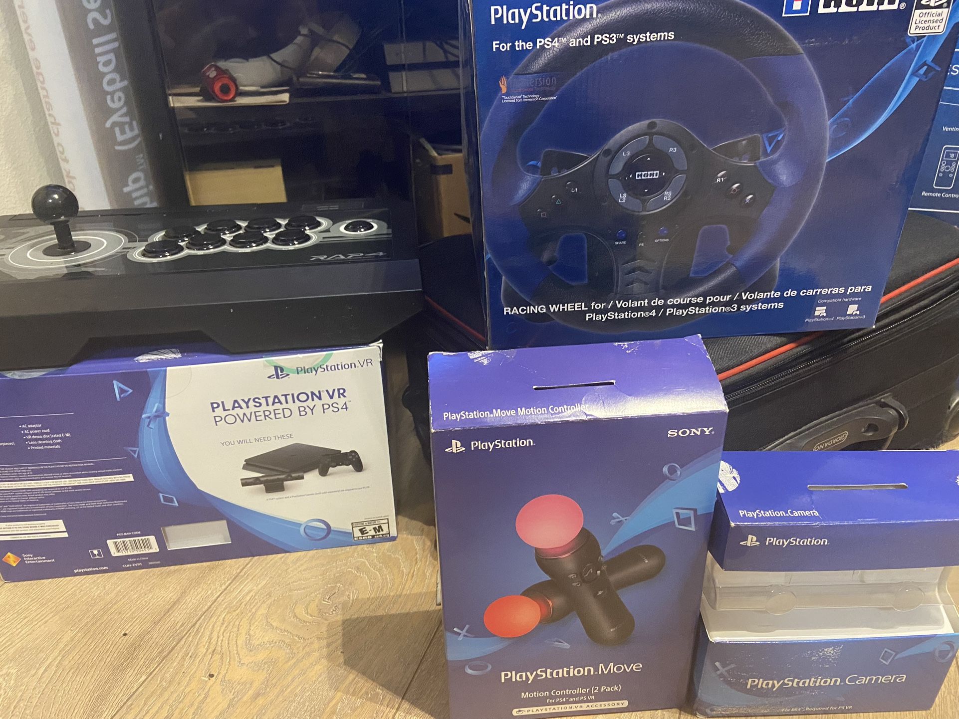 PS4, PS VR, hori arcade stick, PS motion controller 2 pack, PS camera, racing wheel.
