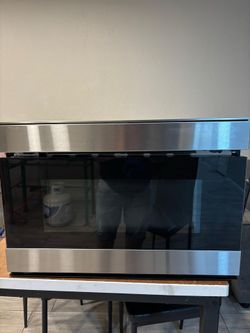 Microwave drawer 2021 sharp works perfect in good condition. Free delivery to the garage.