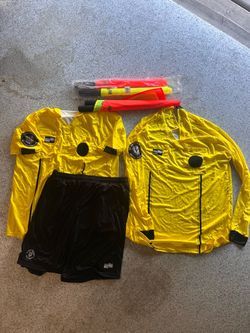 Soccer referee uniform and flags