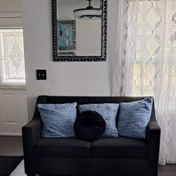 Sofa And Love Seat With Blue Pillows