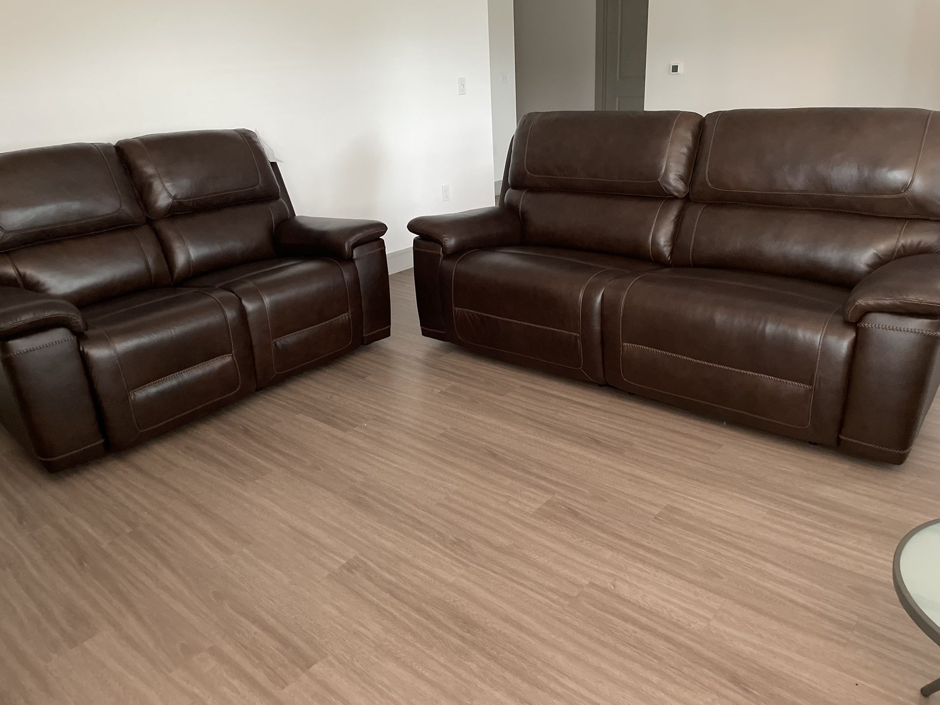 $900 (negotiable) Wentler Dual Power Reclining Sofa And Loveseat Pair (Brown Leather)
