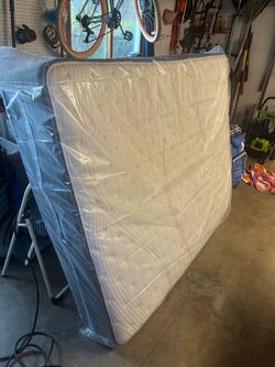 Queen Mattress Still in Plastic/frame