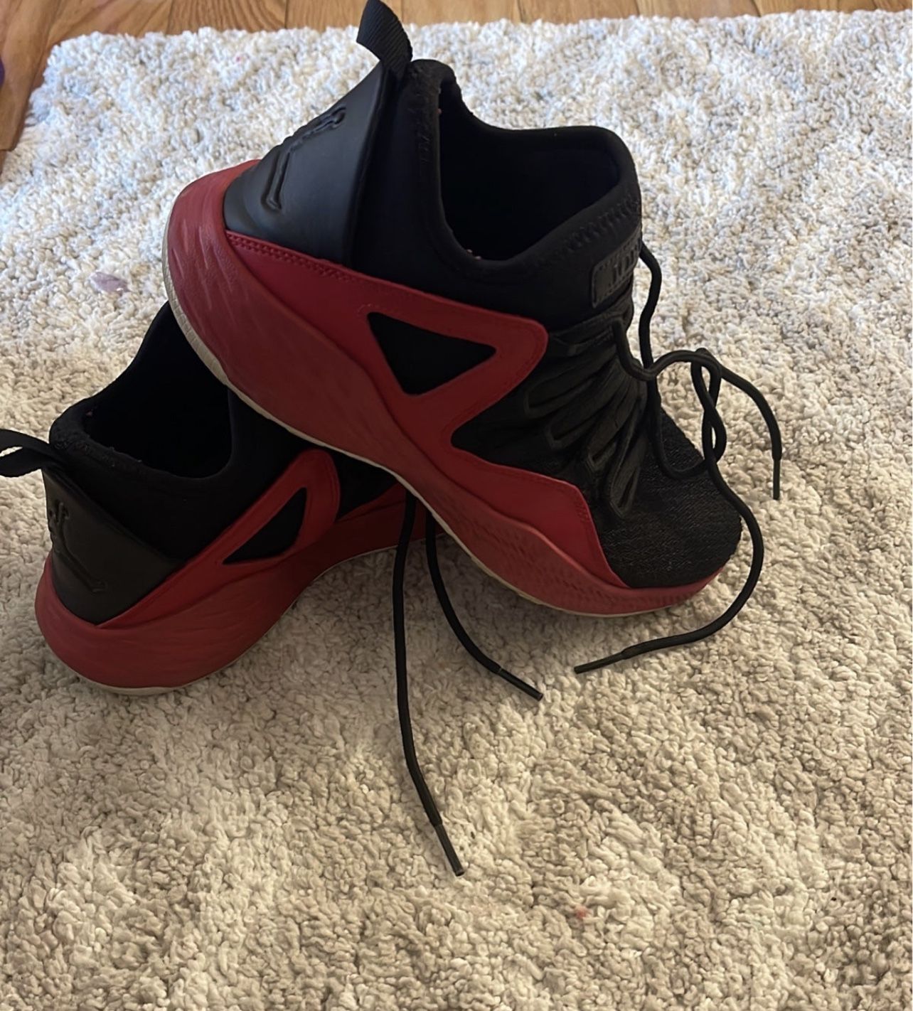 Jordan sneakers black and red size 5.5Y