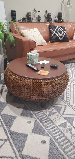 Beautiful dark brown round raffia coffee table with storage