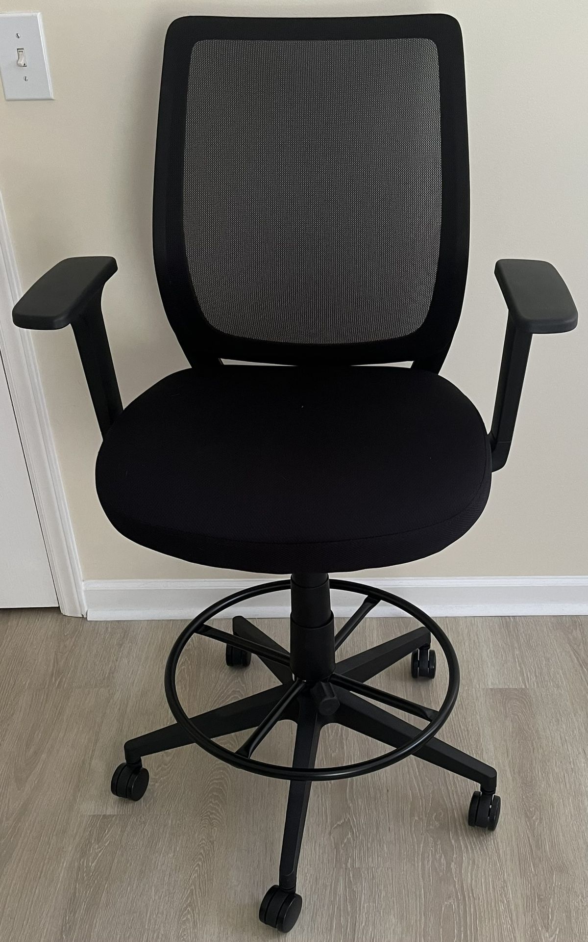 Black Swivel Chair for adjustable height work desks, drafting tables.