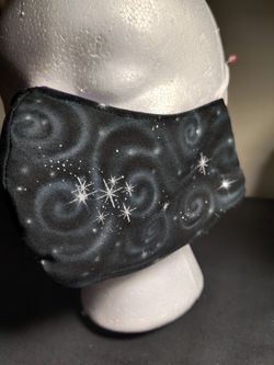 Swirls and stars face covering