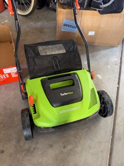 NEW IN BOX..Turf sweeper