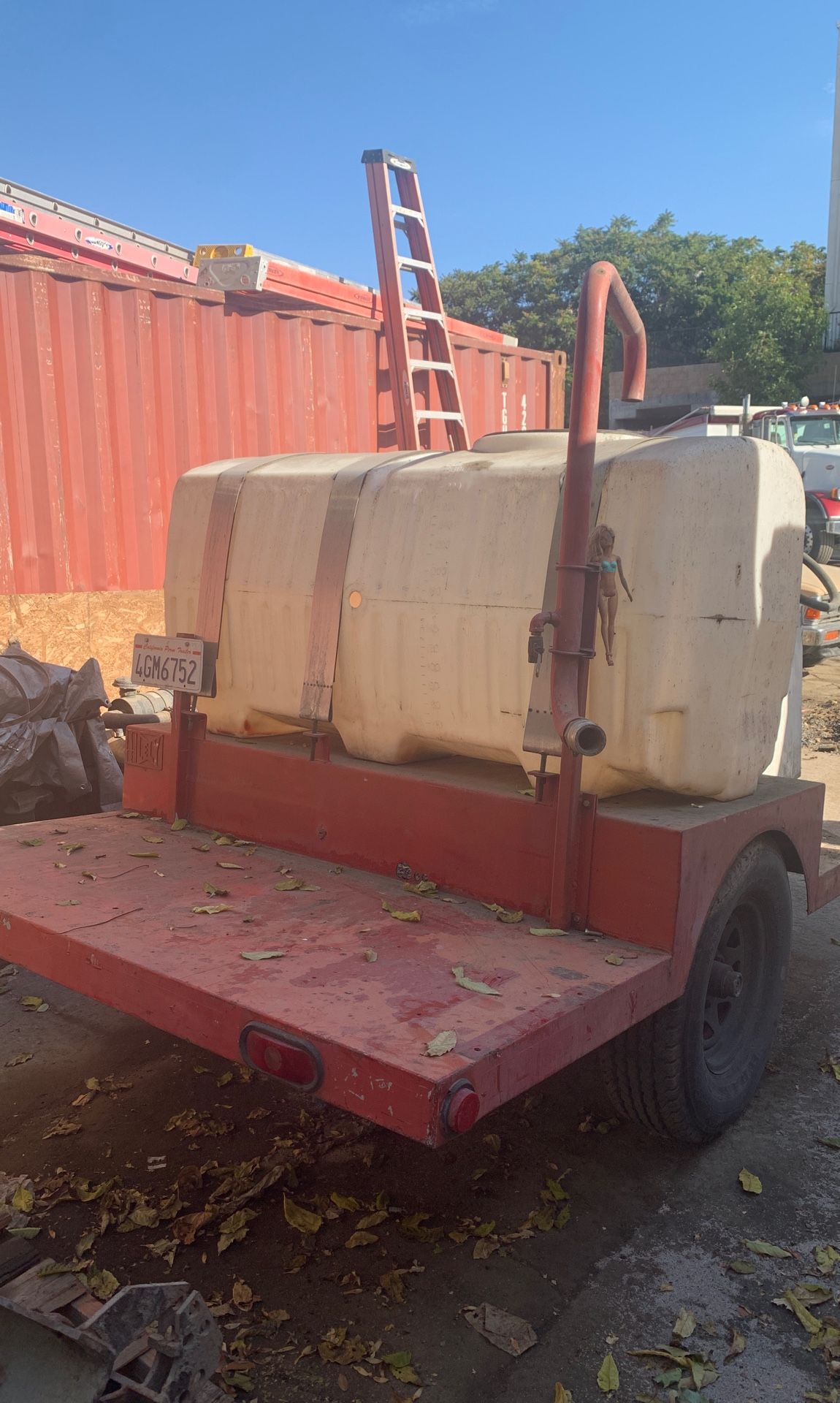 Water tank trailer with engine