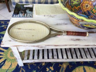 tennis racquet wilson profile legendary 4.5 grip with older strings.