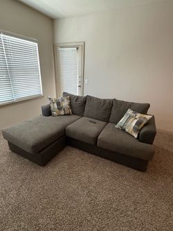Gray Reversible Sectional Sofa – Excellent Condition