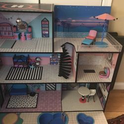 L.O.L doll house with furniture and dolls