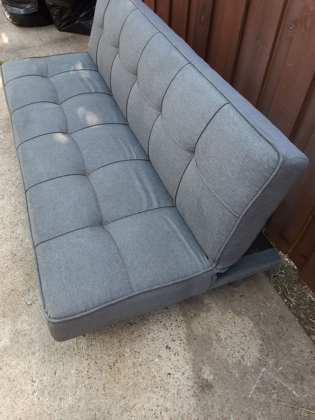 Tufted Gray Futon (adjustable back)$100.00 cashonly (serious buyers)