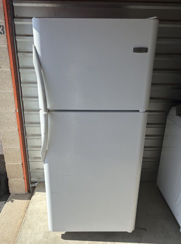 White Frigidaire Refrigerator And Freezer