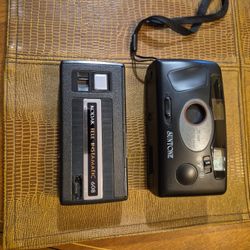 Two vintage cameras.The first is a kodak, 608, and the second is the suntone 35mm
