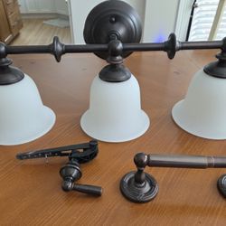3 light fixture, toilet paper holder and toilet handle