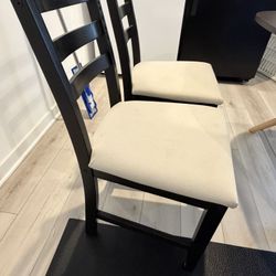 Two IKEA Lerhamn chairs