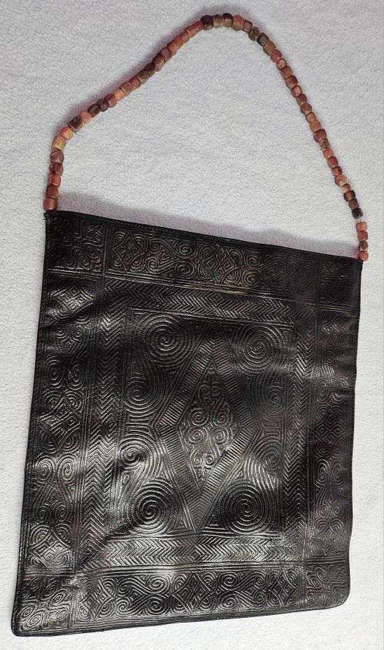 Cole Haan 1928 black tooled leather handbag 