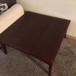 3 Couch Set And A Wooden Table