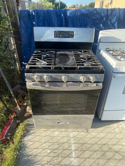Gas  stove everything works great Estufa de gas natural trabaja bien todo