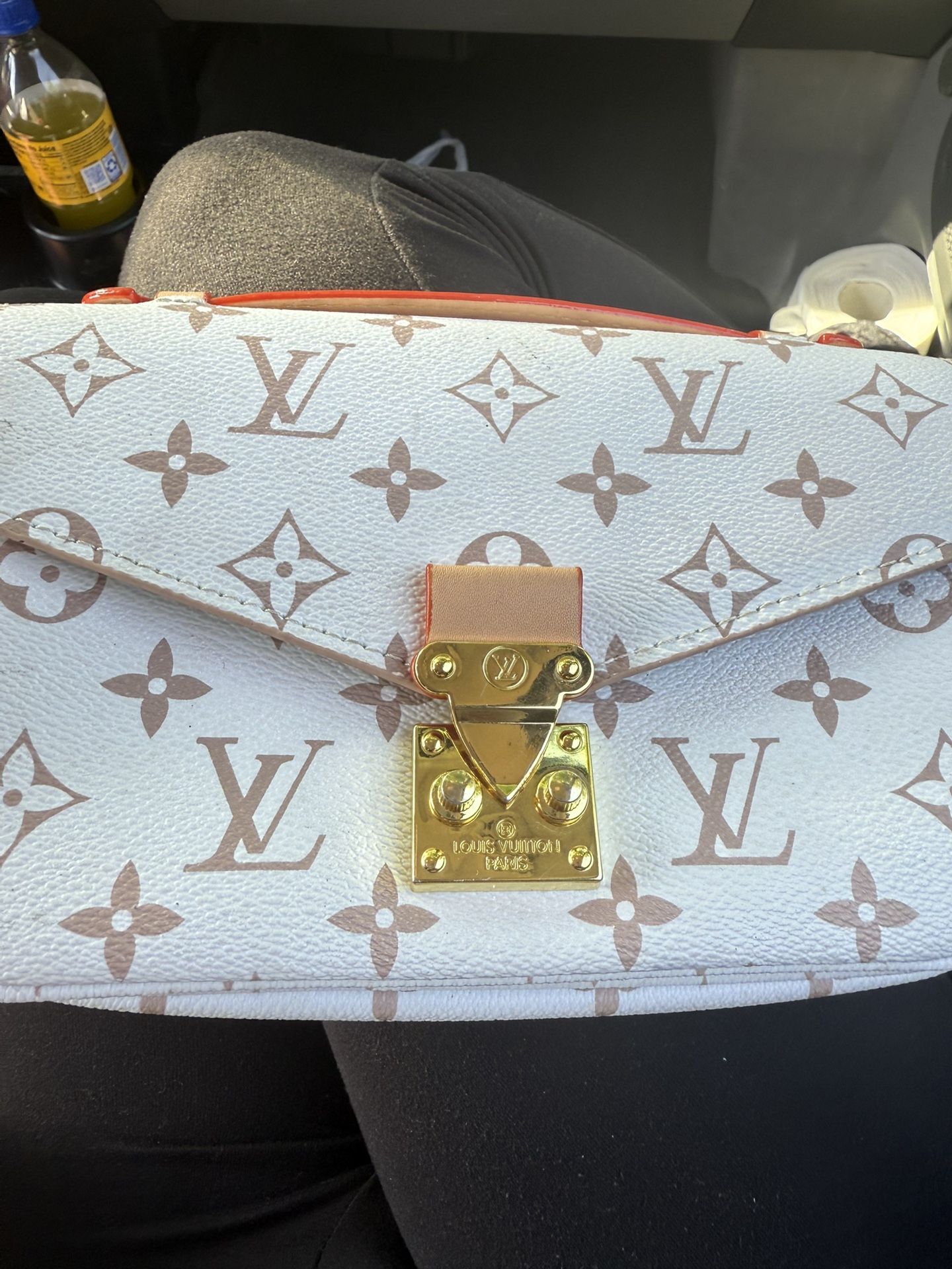 A Possible Louis Vuitton Pochette Métis East West bag in Monogram Canvas