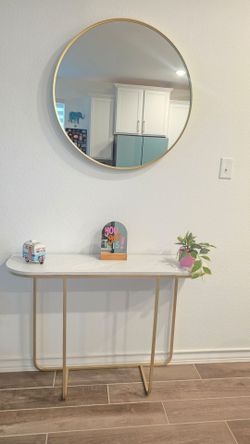 Console table and gold mirror set
