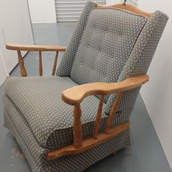 vintage upholstered swivel rocking chair (